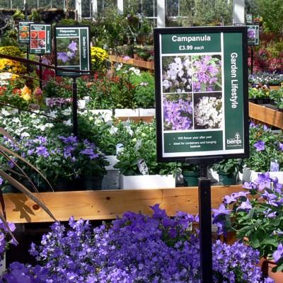 Green Magic Garden centre stands screwed to benches